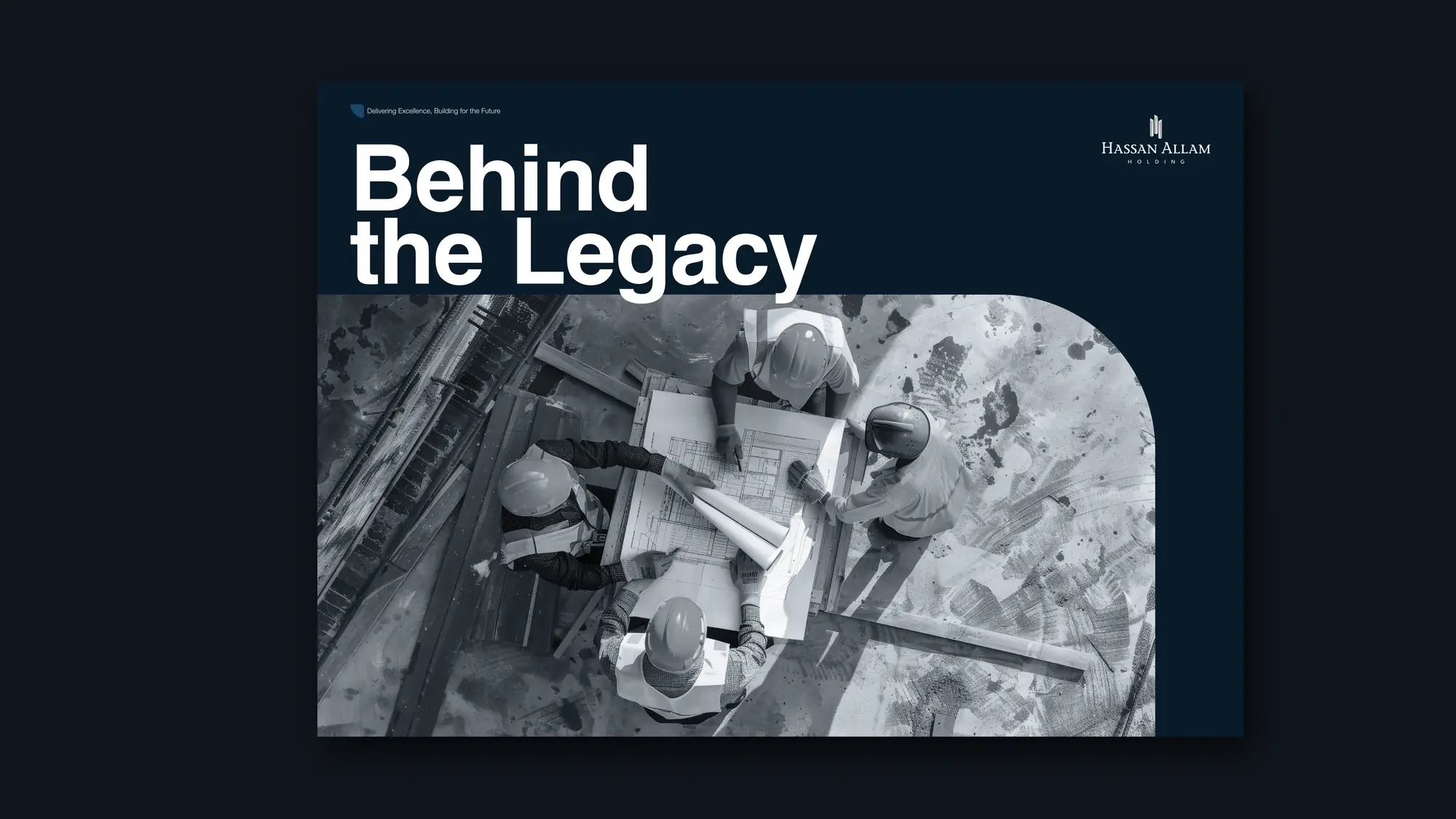Open magazine spread with a black and white aerial photo of engineers reviewing plans